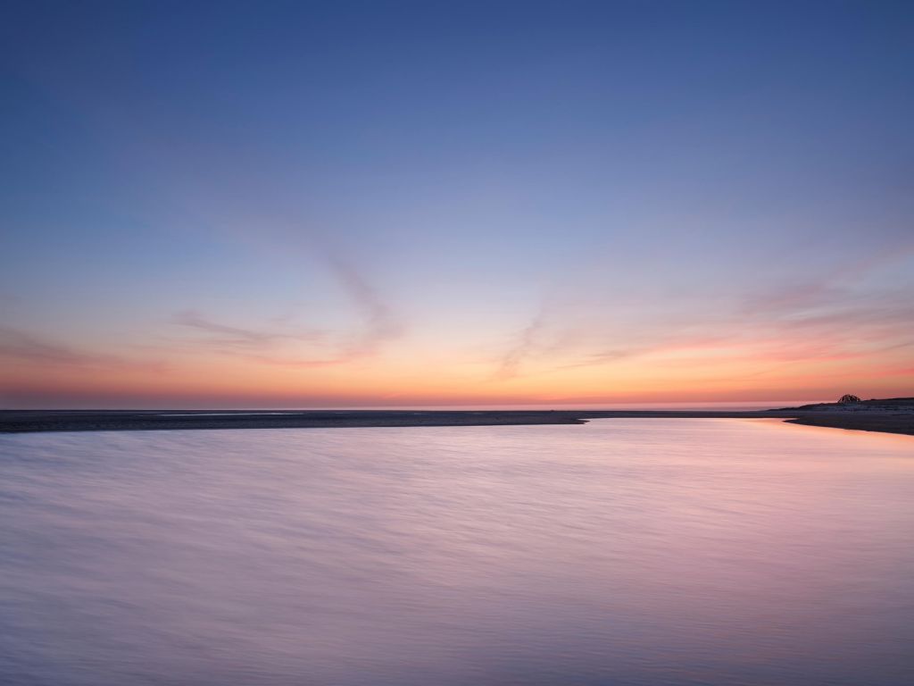 Coucher de soleil sur l'eau