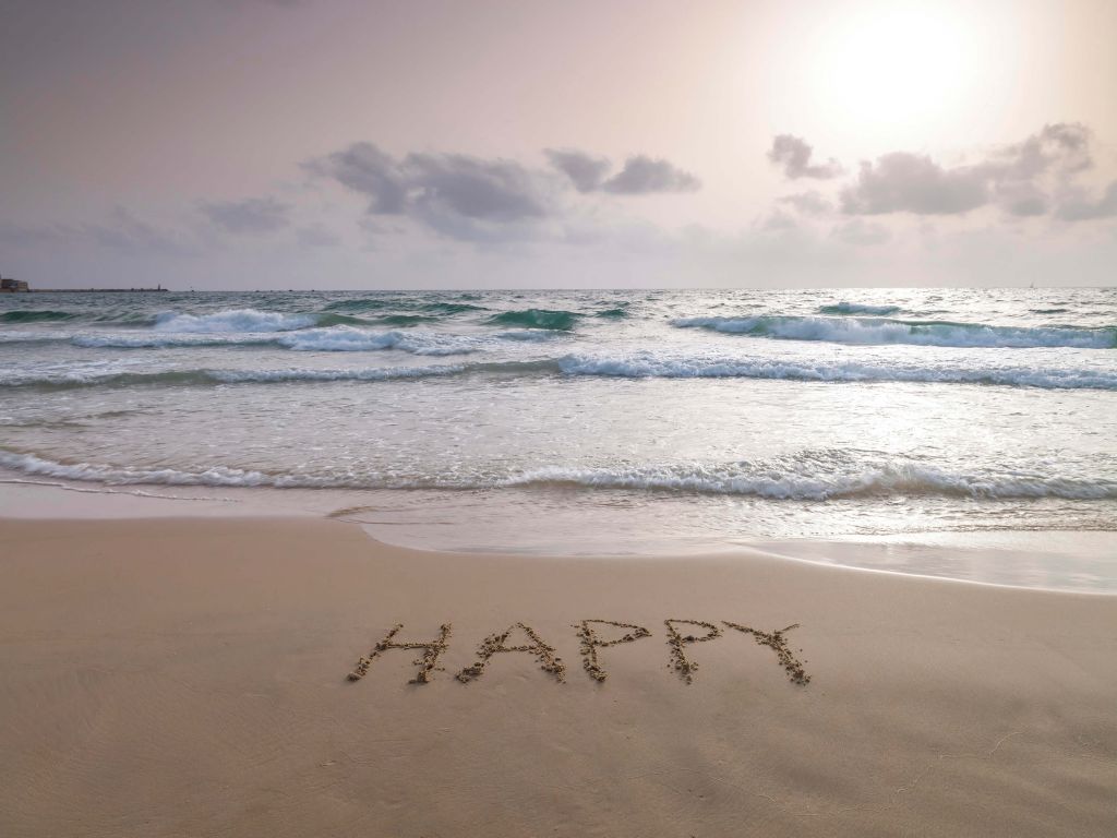 Écriture sur le sable