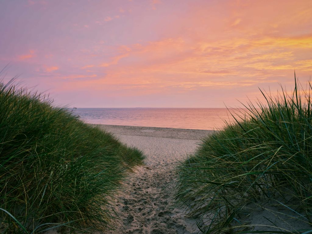 Passage de la dune avec le lever du soleil