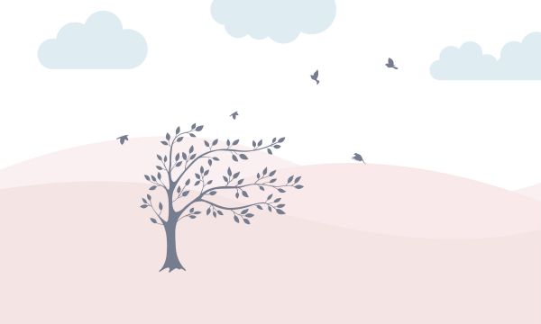 Des collines roses avec un arbre
