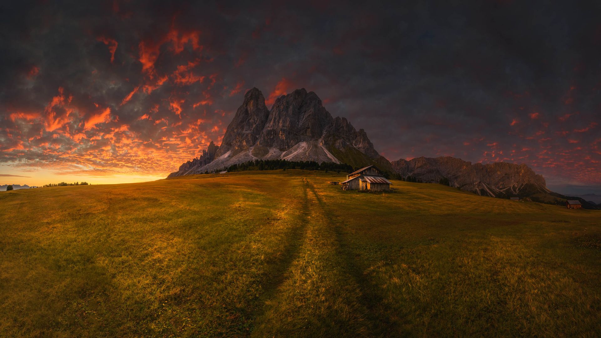 Sunset by a mountain main product photo